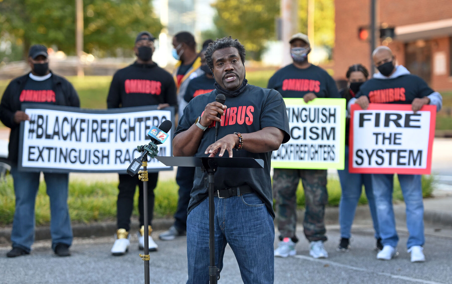 Omnibus black firefighter press conference